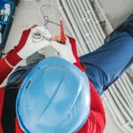 Electrician installing an electrical conduit